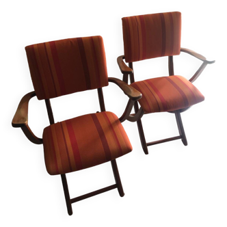Two folding chairs with armrests
