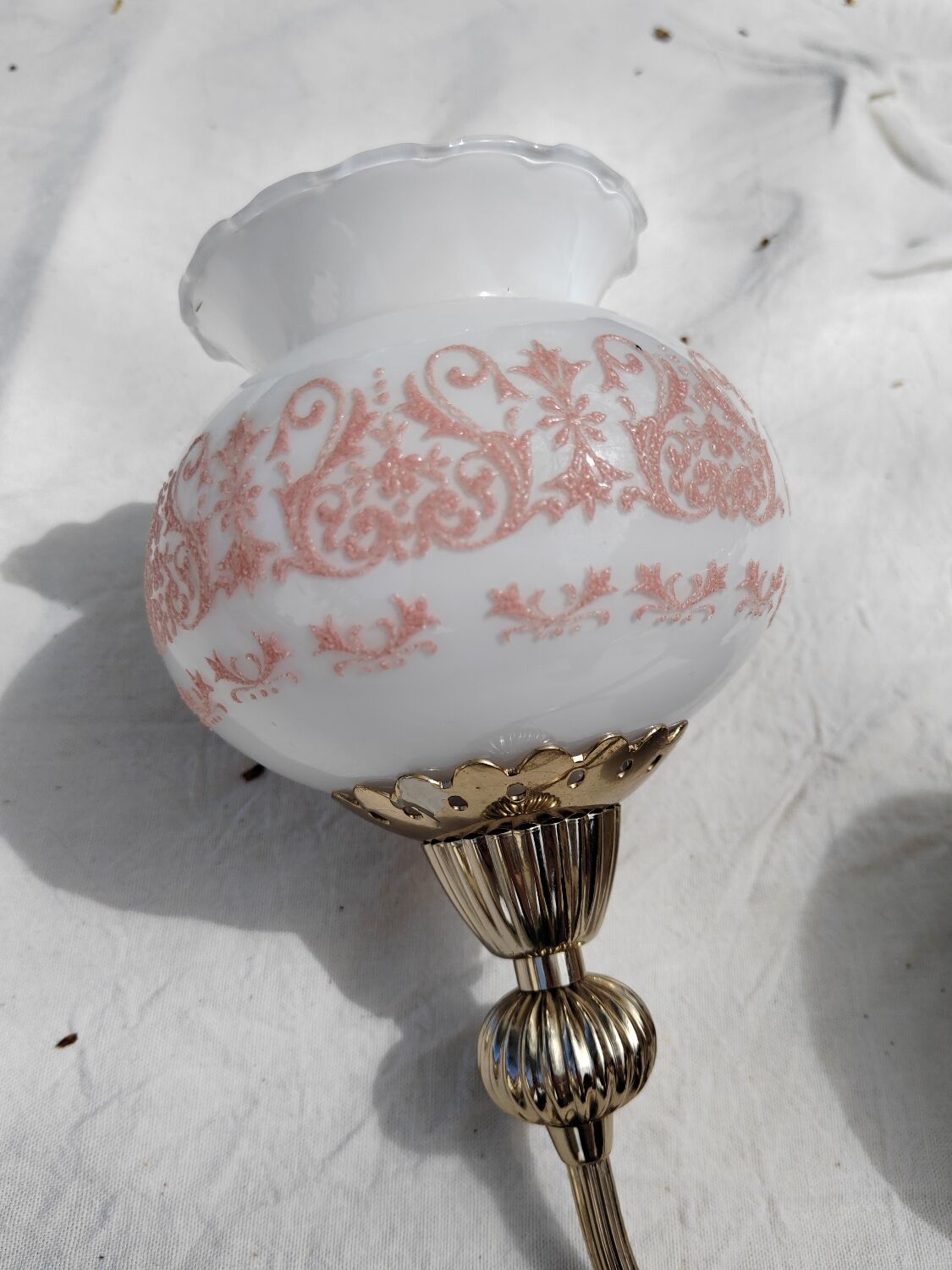 Pair of wall sconces with floral lampshades