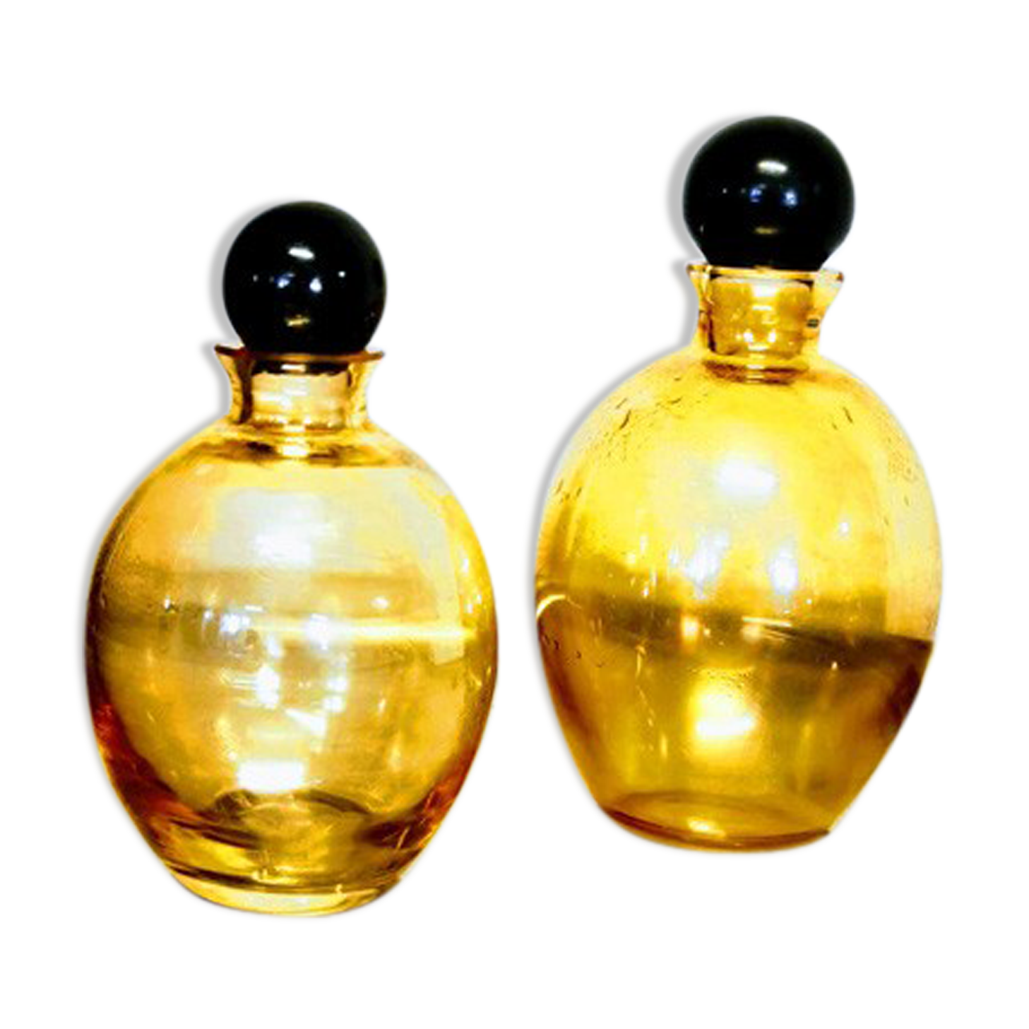 Duo of small amber bottles