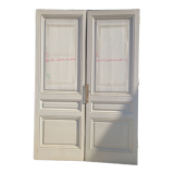 Double porte de communication avec sa serrure