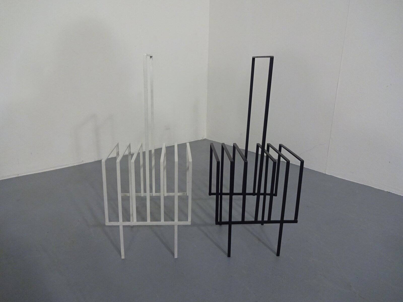 Steel magazine or record racks, 1960s, set of 2