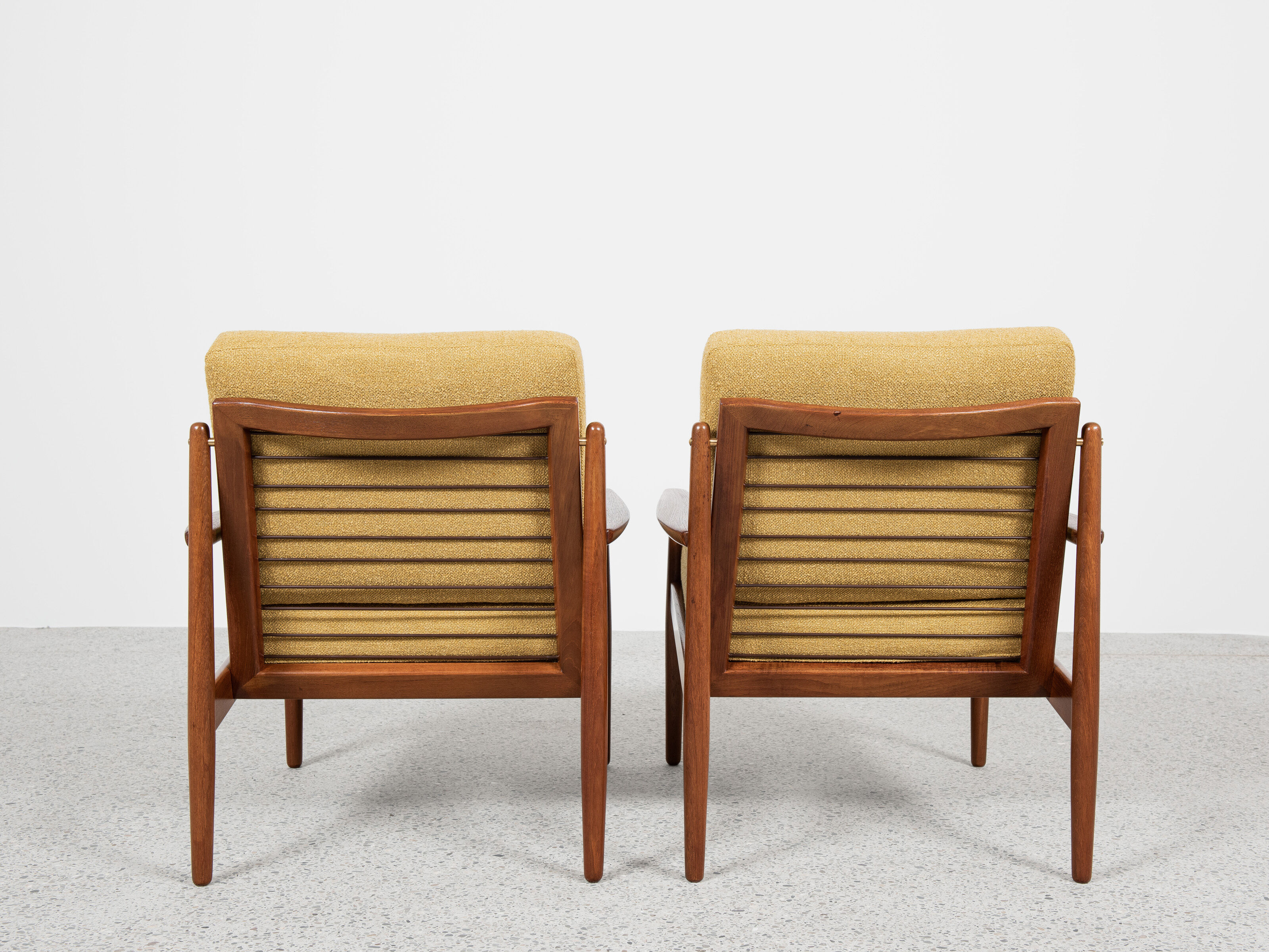 Midcentury Danish pair of easy chairs in teak by Arne Vodder for Glostrup