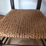 Brutalist armchair in woven straw