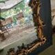 Antique mirror in stucco and wood