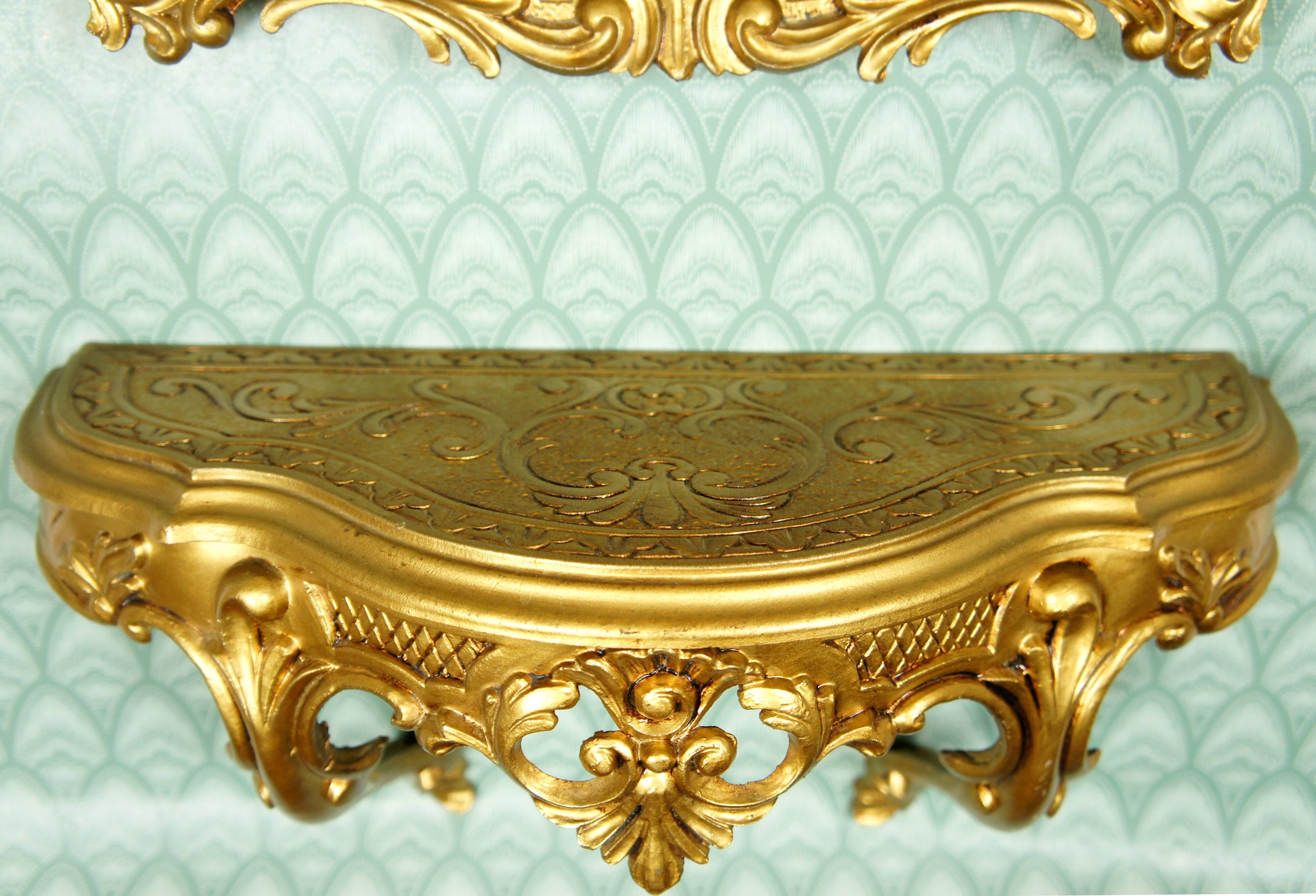 Entrance console & mirror sound, gilded around 1970