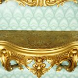 Entrance console & mirror sound, gilded around 1970