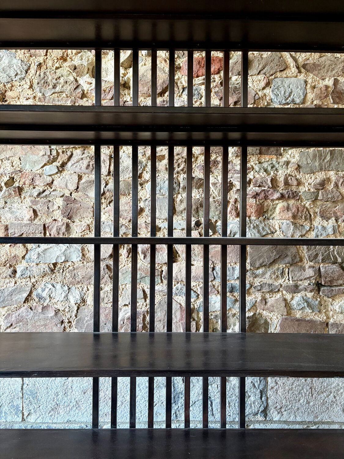 Large industrial black metal shelf – openwork graphic structure