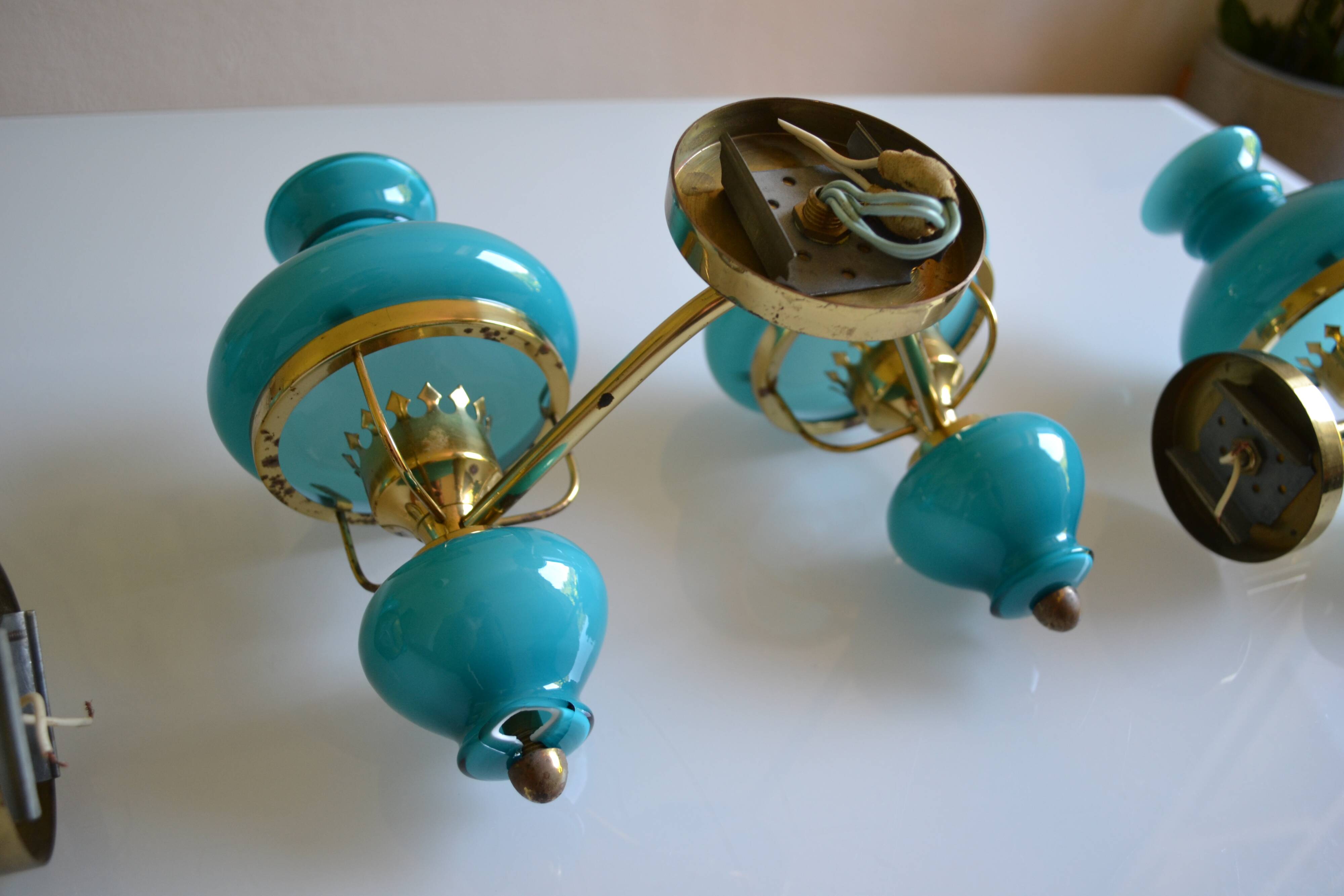 Series of 3 vintage brass and blue opaline wall lamps