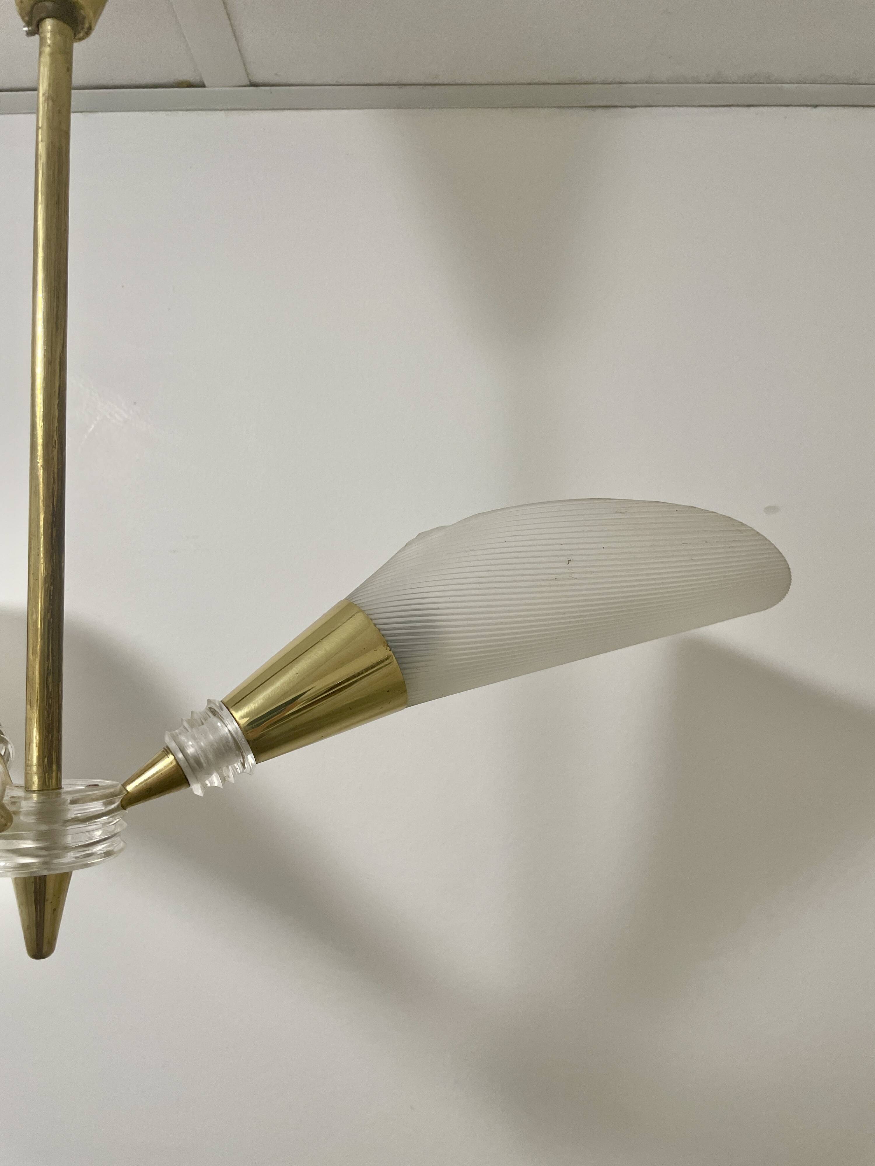 Vintage chandelier with plexiglass and brass cones