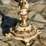 Carved and lacquered wooden side table.