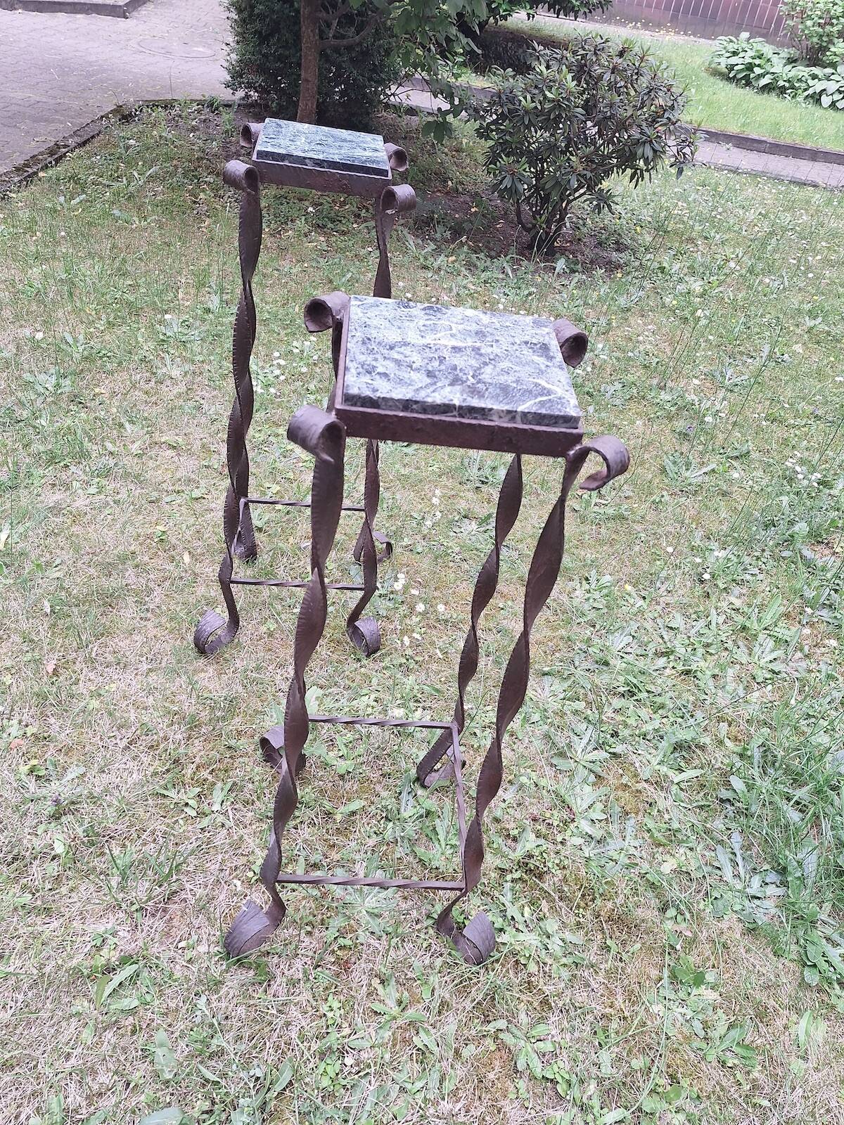 Pair of Brutalist patinated iron and veined marble columns, 1960s