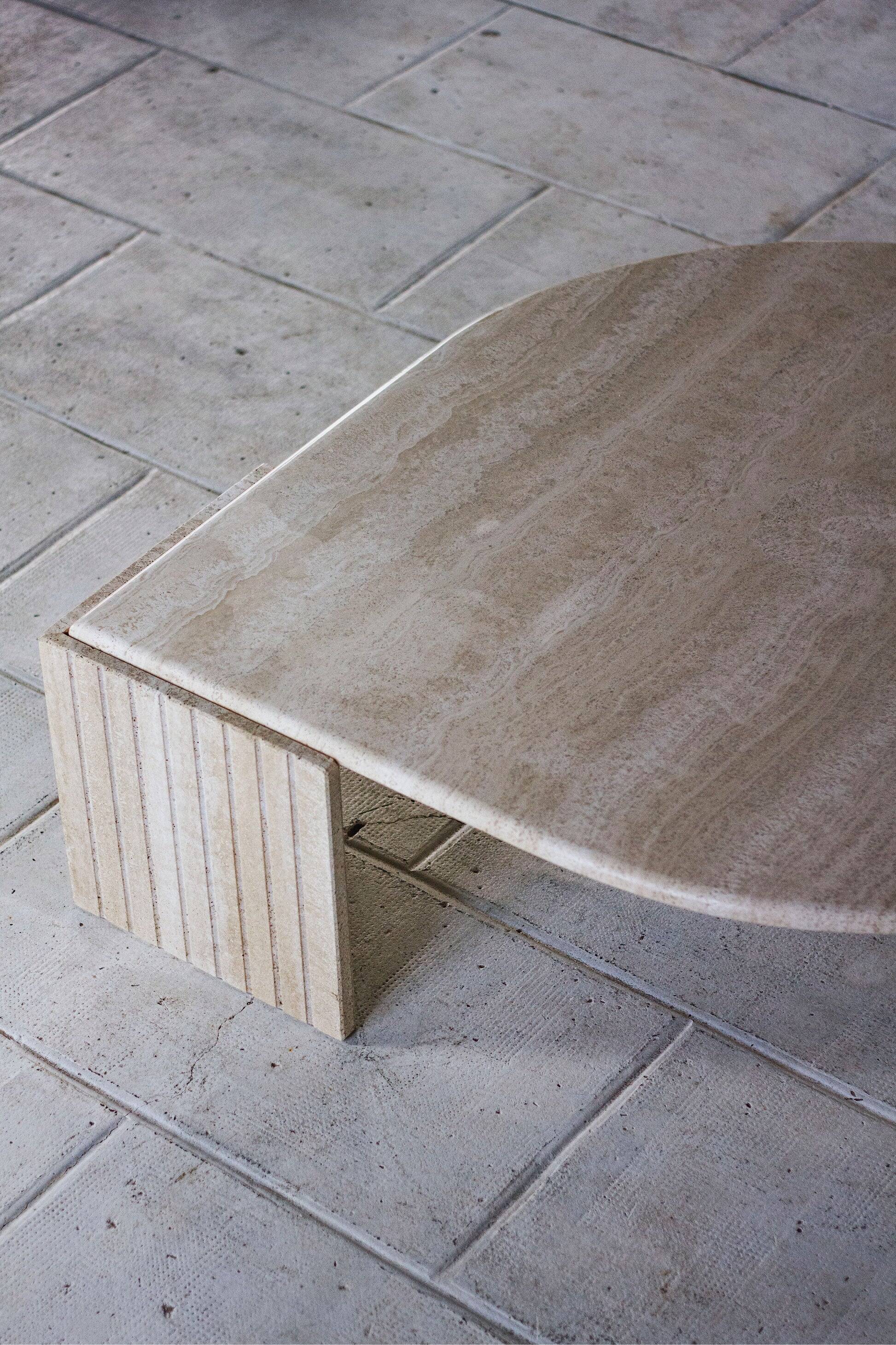 Travertine coffee table "Eye" or "drop" by Roche Bobois, 1980