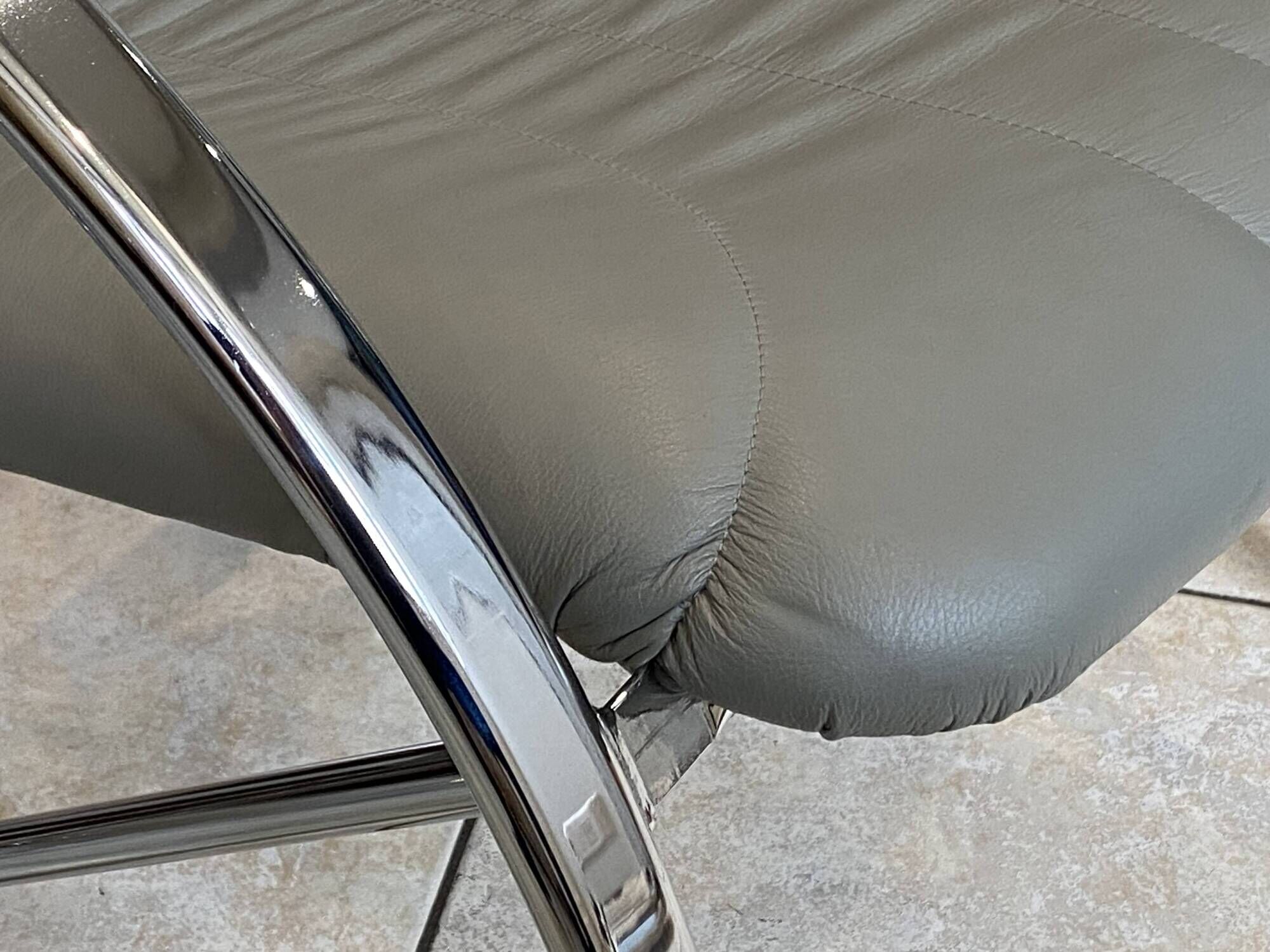 Pair of Souvignet armchairs, grey leather, chrome, 1980.