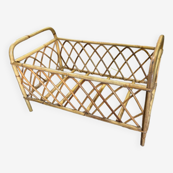 Vintage rattan doll bed