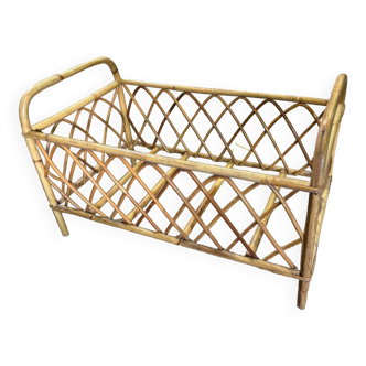 Vintage rattan doll bed