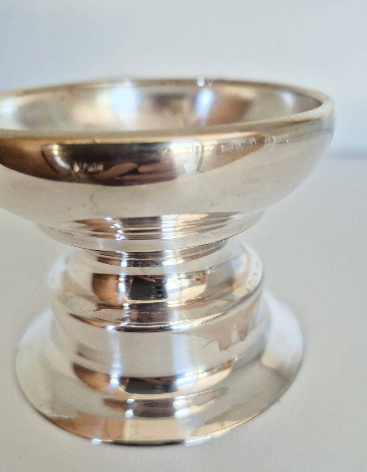 Antique silver candle holder.