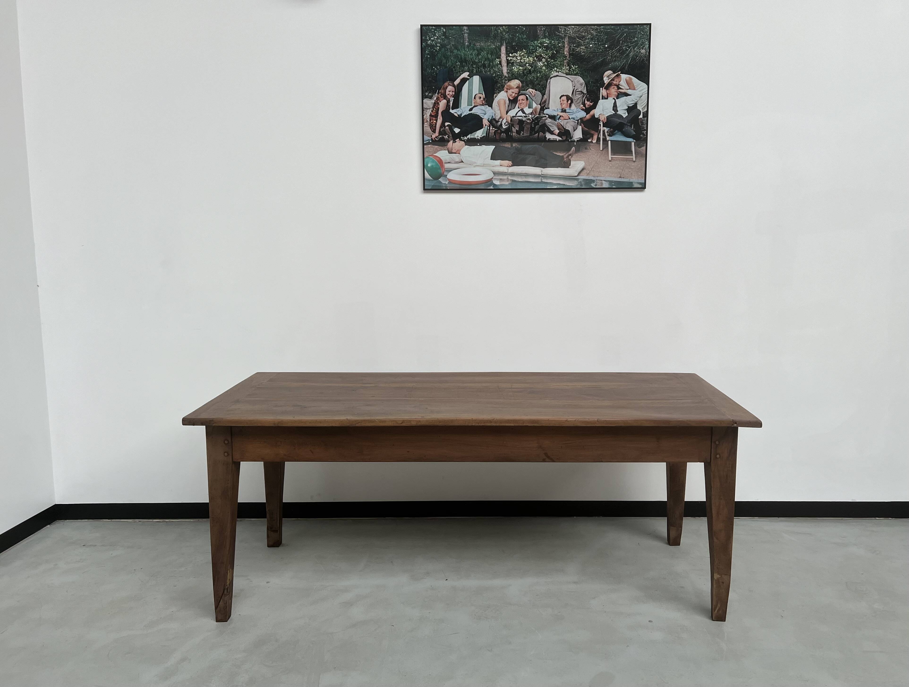 Solid walnut farmhouse table with spindle legs