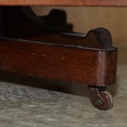 Restored Victorian walnut revolving library.
