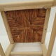 Children's chair of greige color in wood and straw