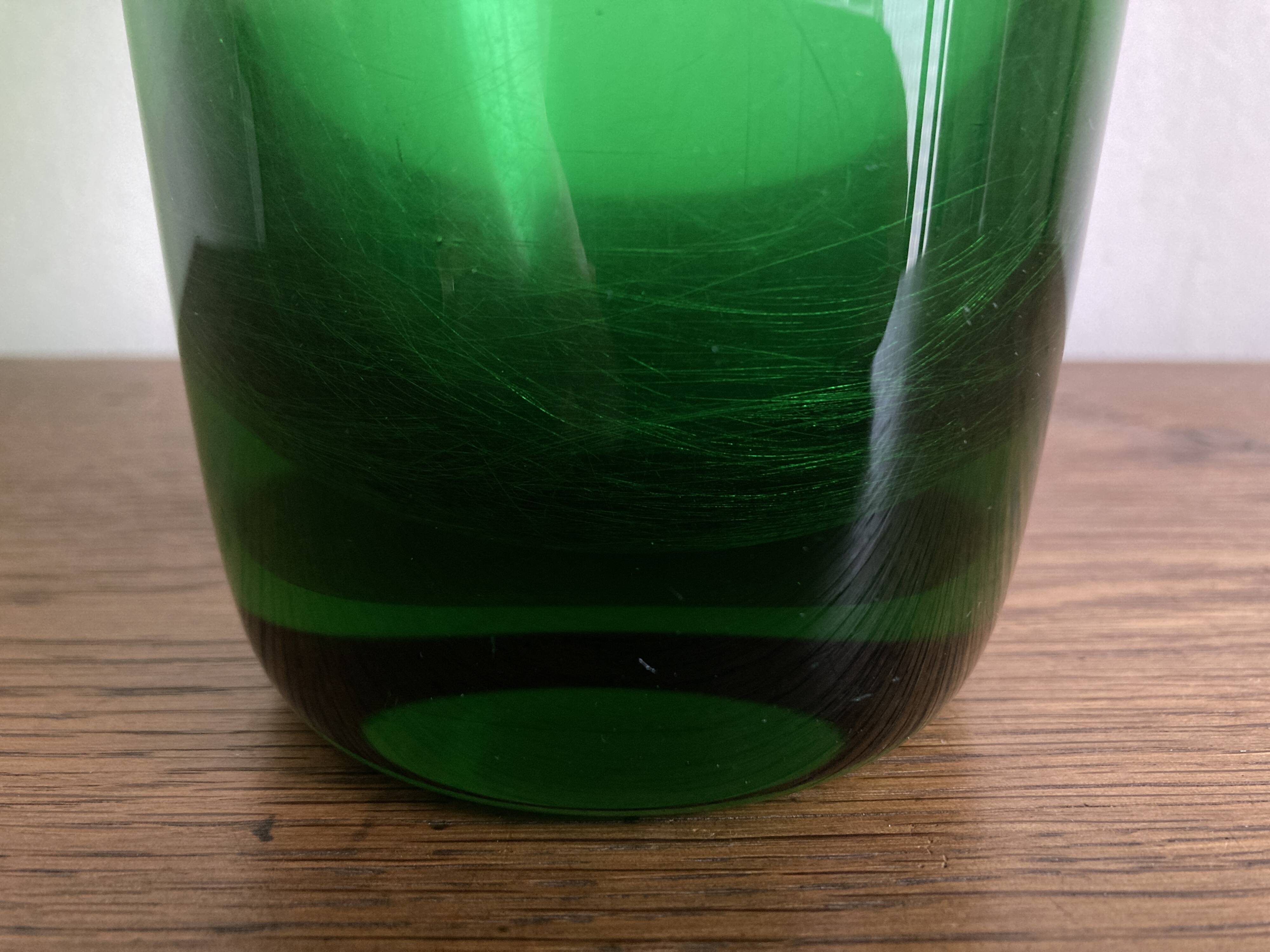 1950s Médicis vase, large Art Deco with handles, made of green blown glass.