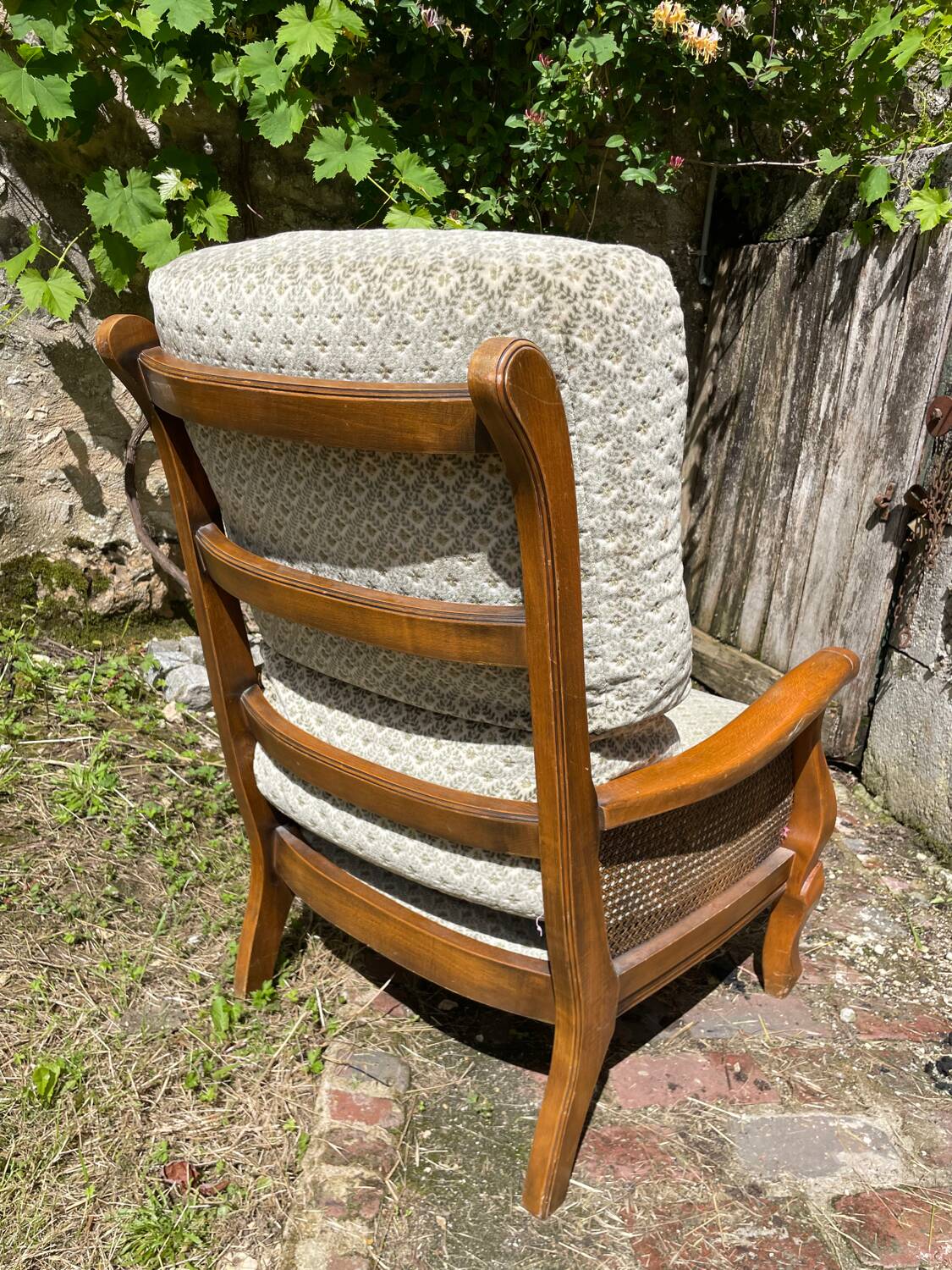 Armchair in wood, cane and velvet