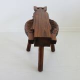 Brutalist cowhide tripod stool in solid wood