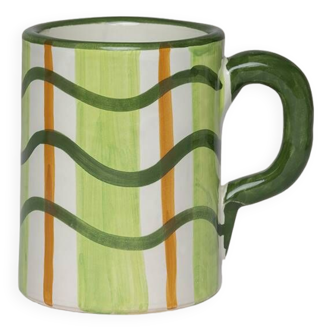 Tasse verte ondulée