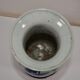 China. Porcelain mallet vase with blue and white phoenix decoration on a rock.