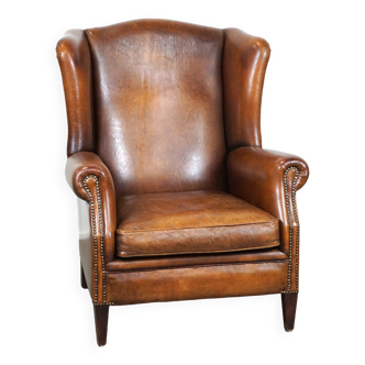 Especially comfortable wingback chair made of sheepskin leather, stunning colors