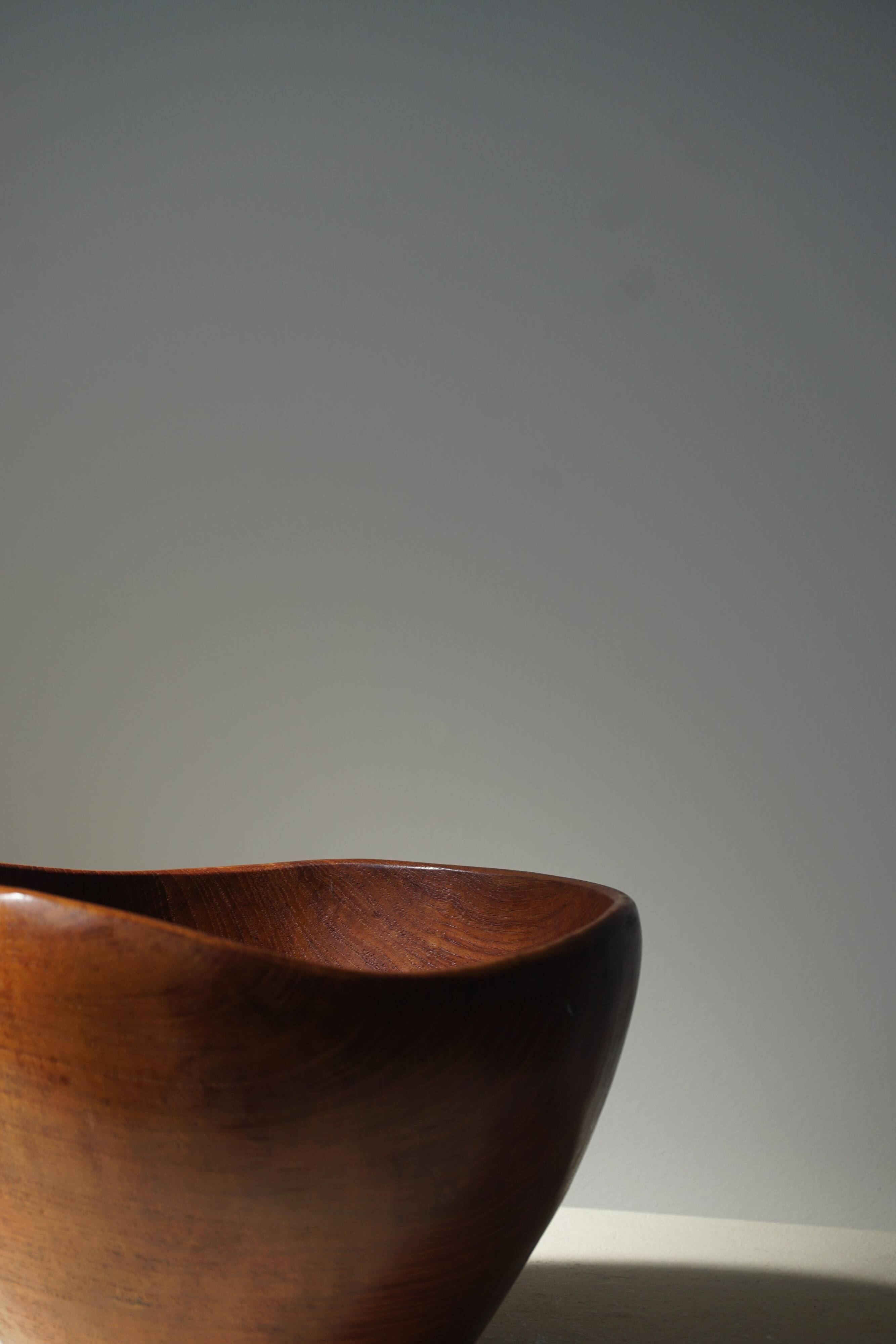 Danish sculptural bowl in teak from the mid-century, handcrafted in the 1960s.