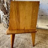 Bedside table with compass feet