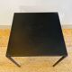 Black coffee table in raw steel Domino model Caravane brand