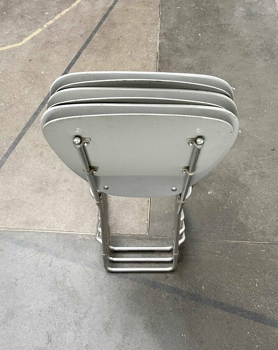 Stackable folding chair in space age style from the mid-century by Armin Wirth for Aluflex, 1960s, set of 3.