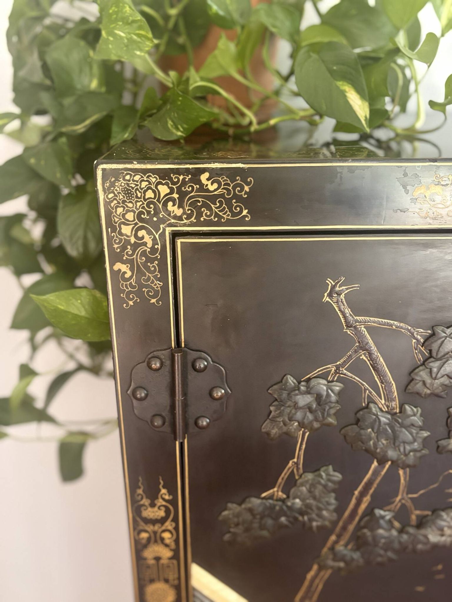 Magnificent black and gold lacquered Chinese cabinet.