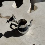 Silver-plated teapot with black handle