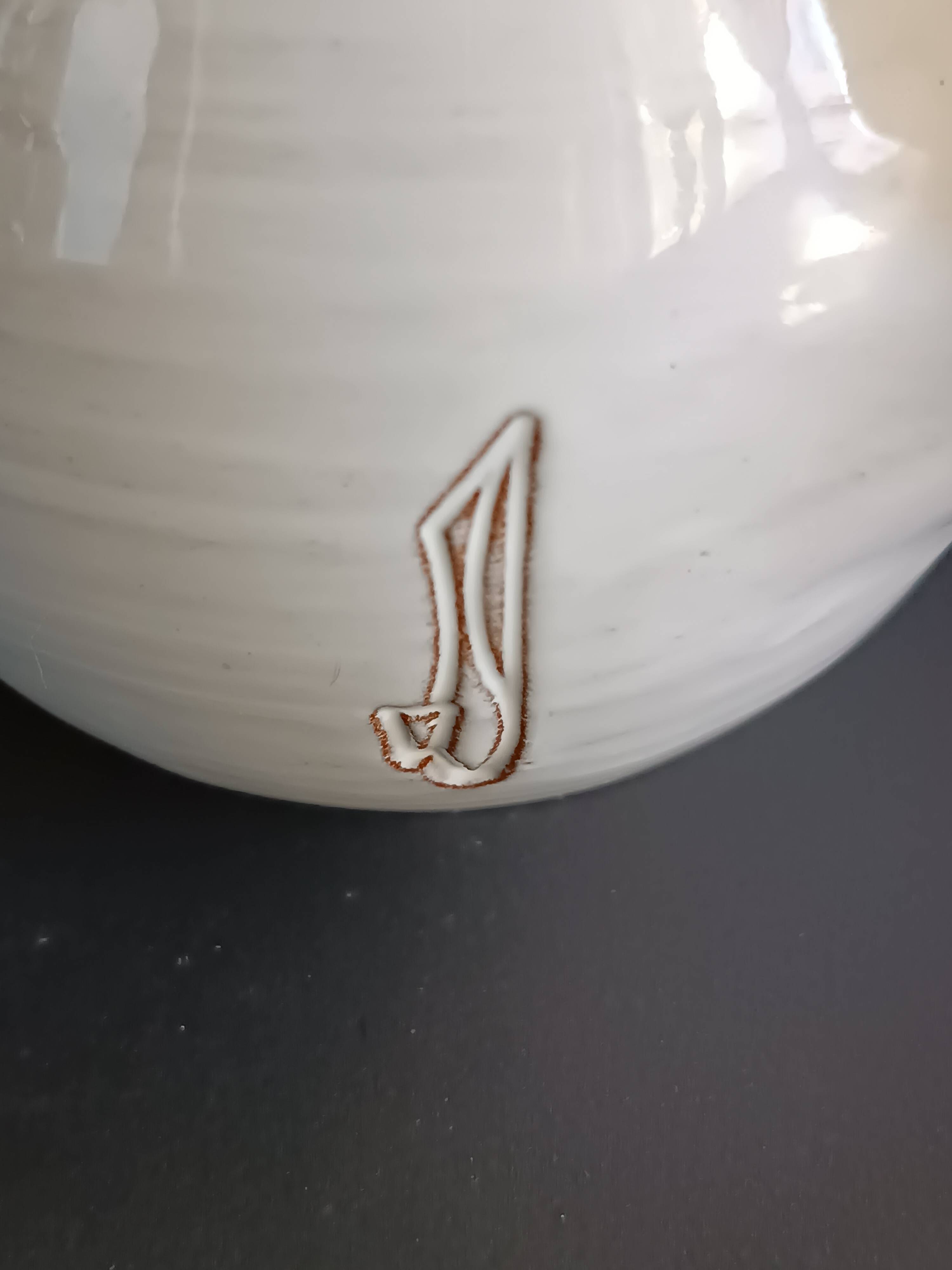 Vintage white glazed ceramic pitcher signed