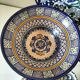 Set of 9 hand-painted Tunisian ceramics.