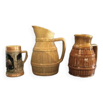 Two pitchers and a small original king beer mug