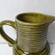 Sarreguemines earthenware pitcher, slip-glazed