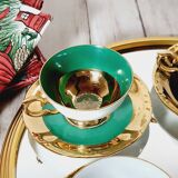 Set of 5 cups and 6 under cups in kahla porcelain