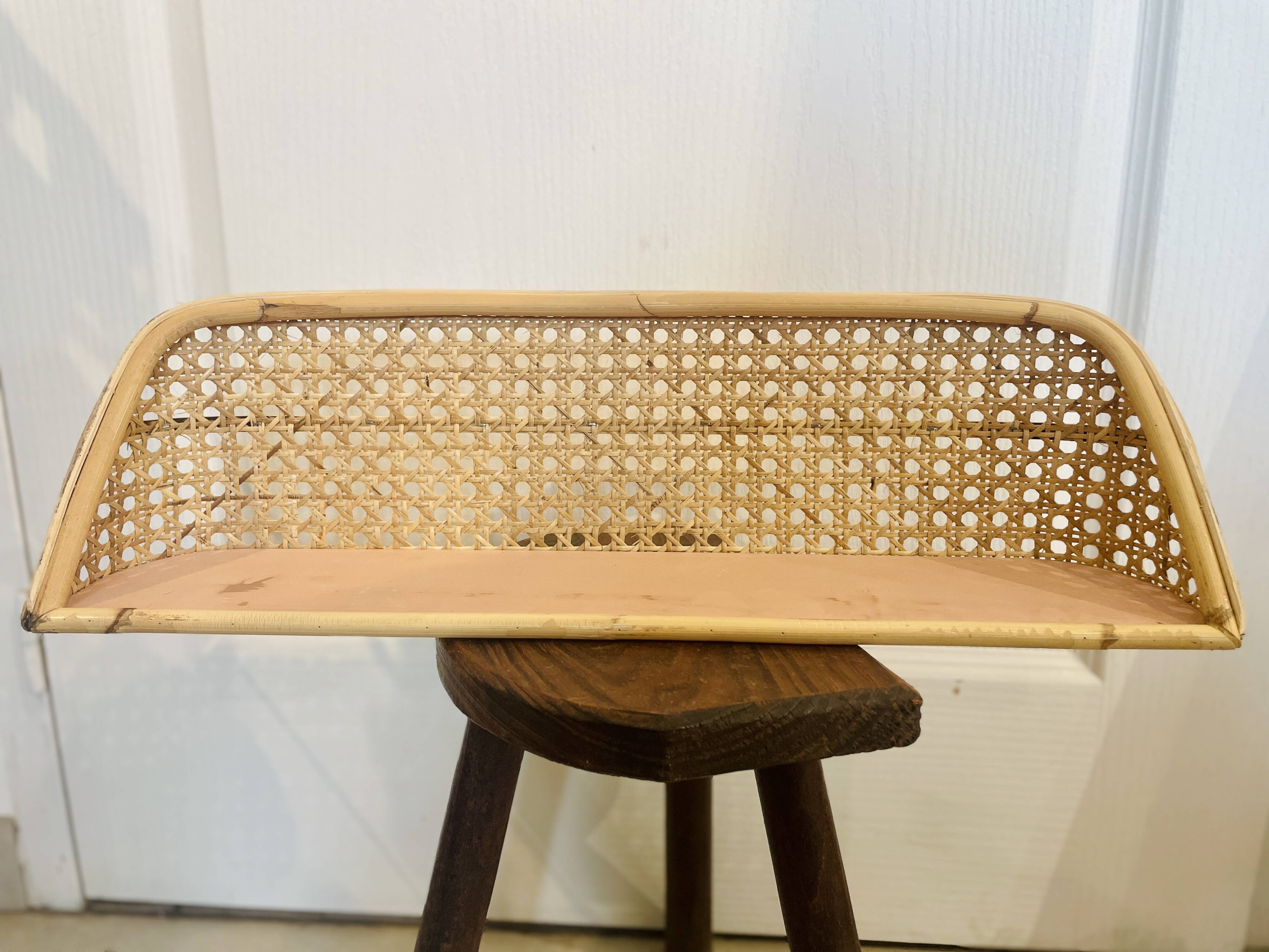 Cane wall shelf