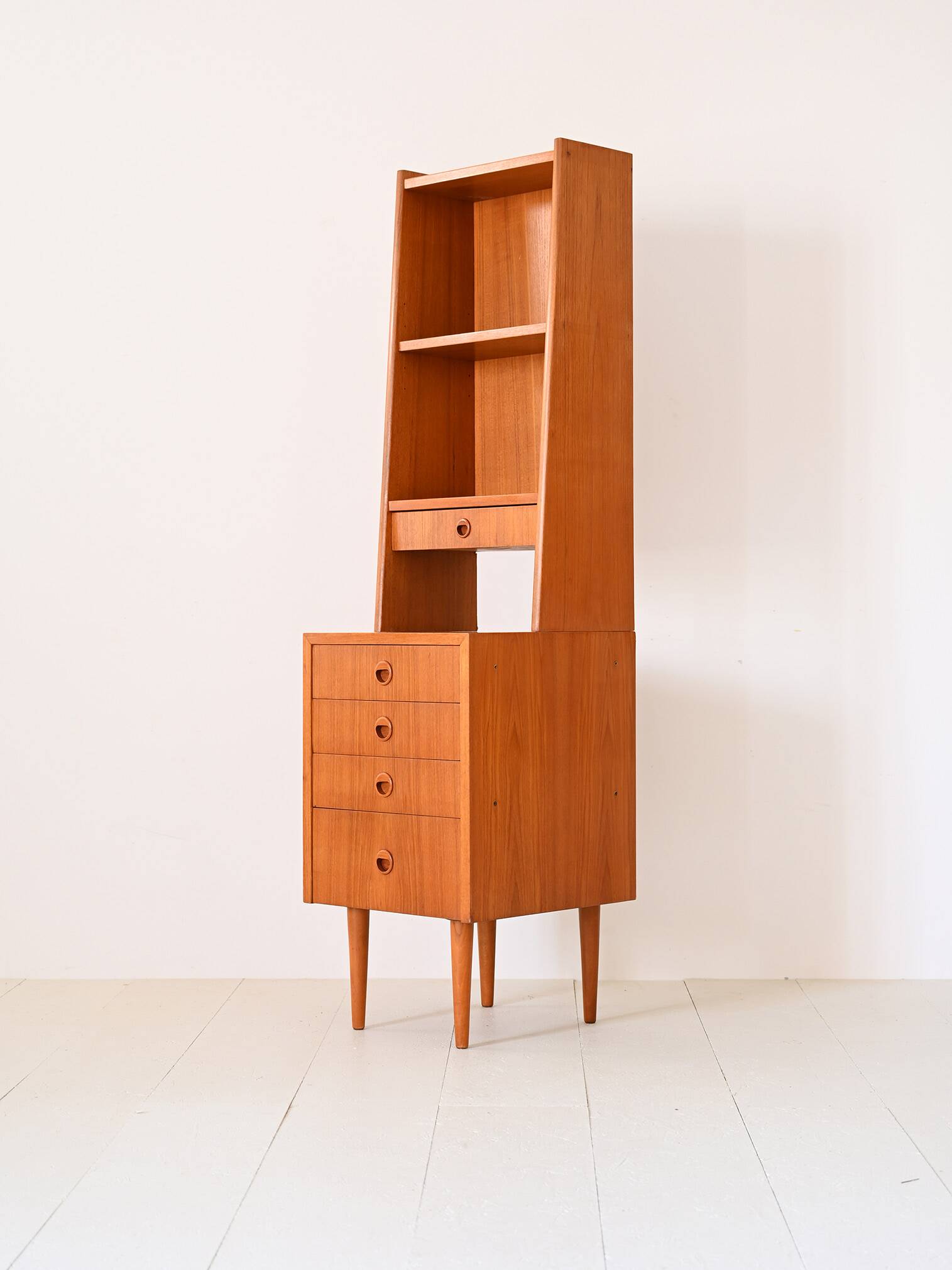 Fine teak bookcase with drawers