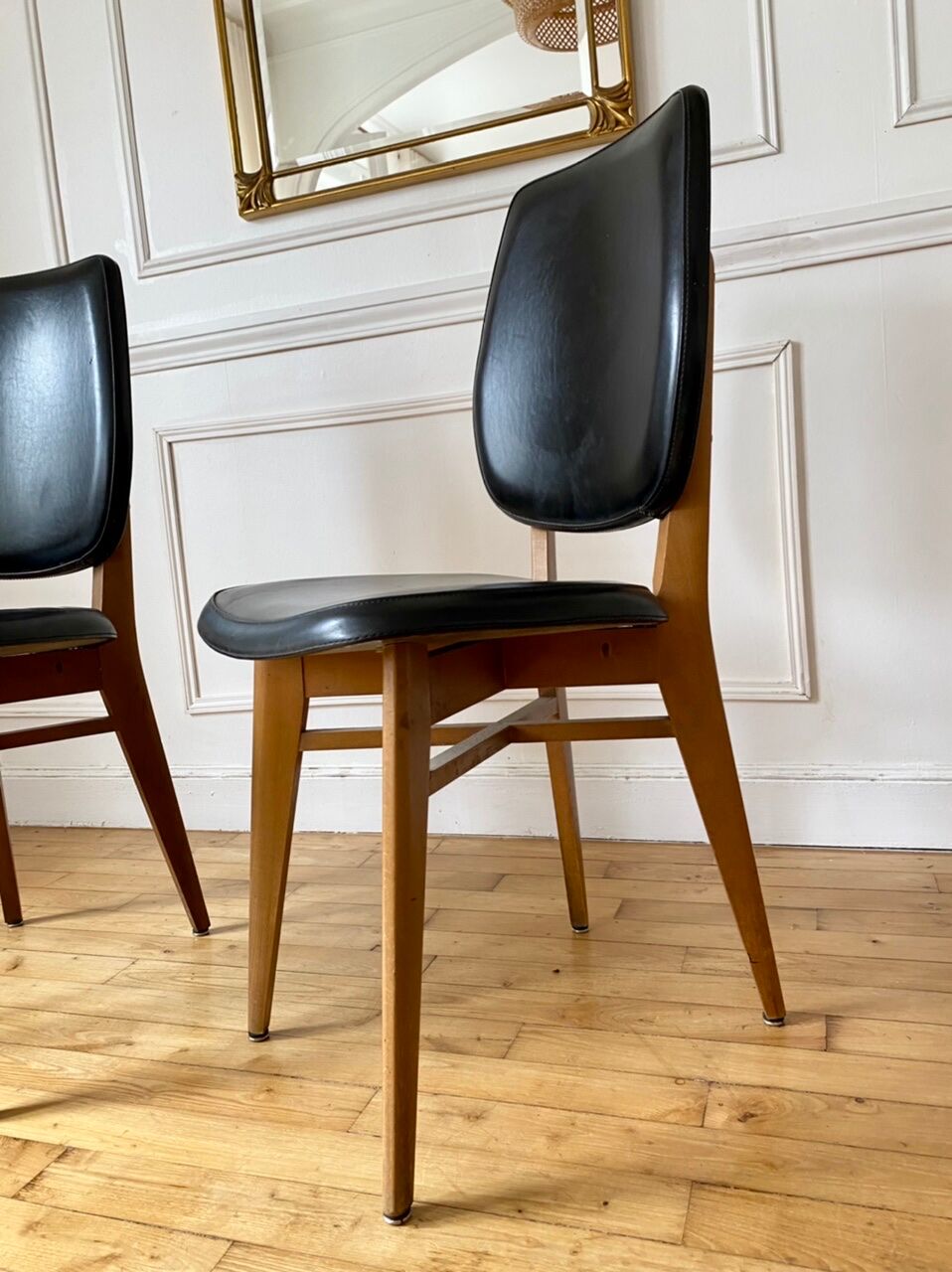 Pair of vintage wood and leather chairs