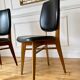 Pair of vintage wood and leather chairs