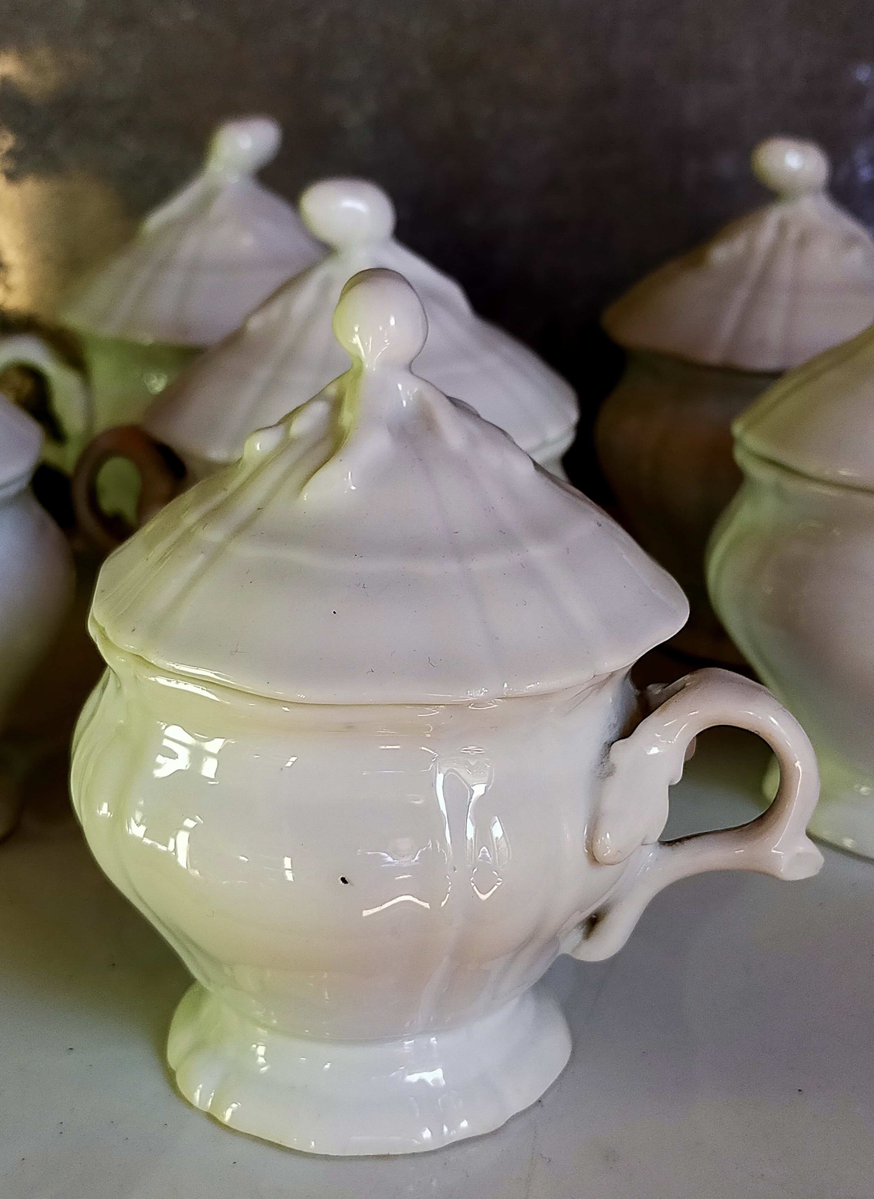 Set of seven covered pots and tray old white slurry nineteenth