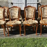8 cherry wood chairs in Louis XV style with velvet upholstery.