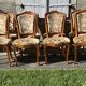 8 cherry wood chairs in Louis XV style with velvet upholstery.