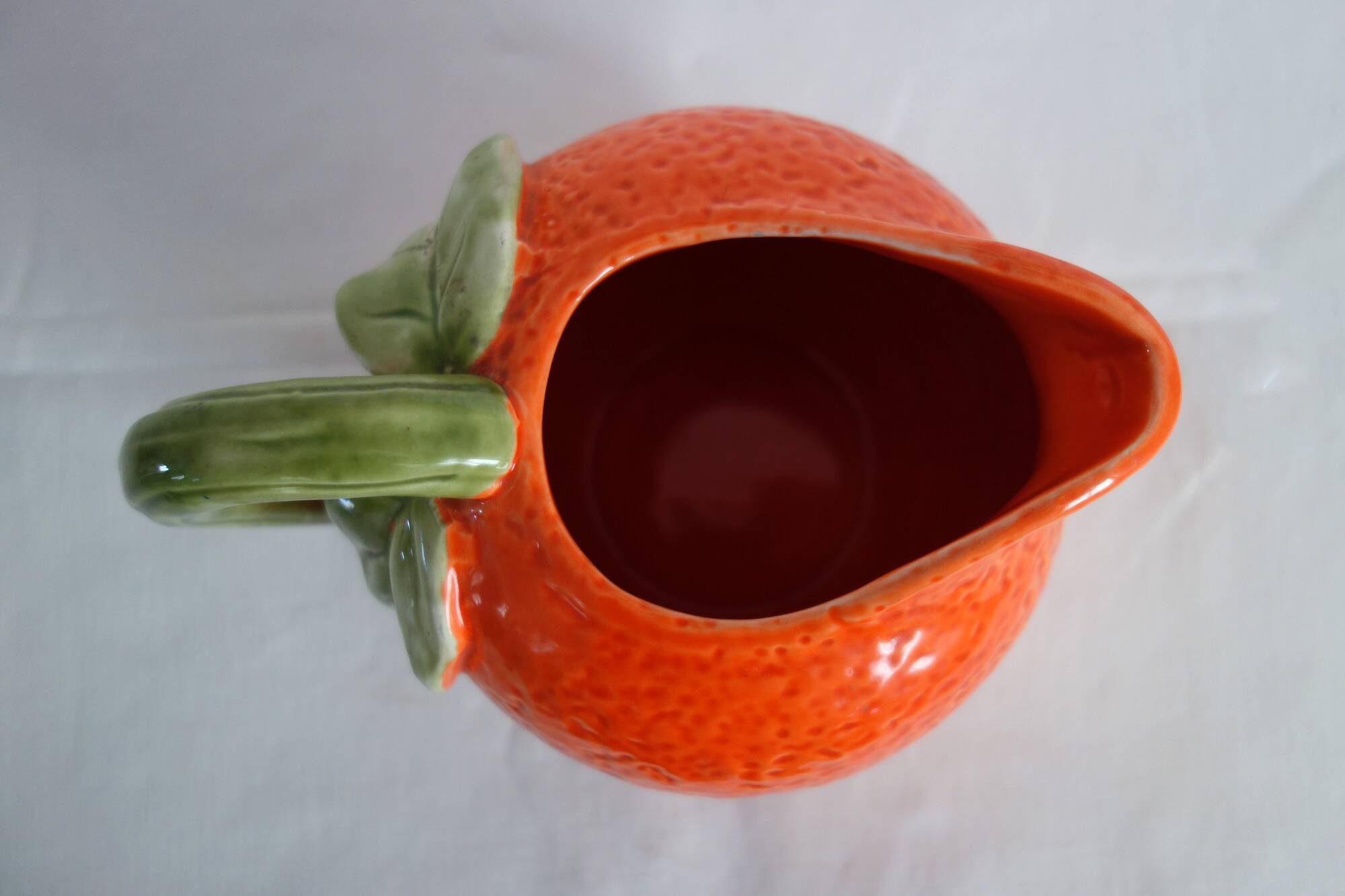 Vintage orange slipware ceramic jug
