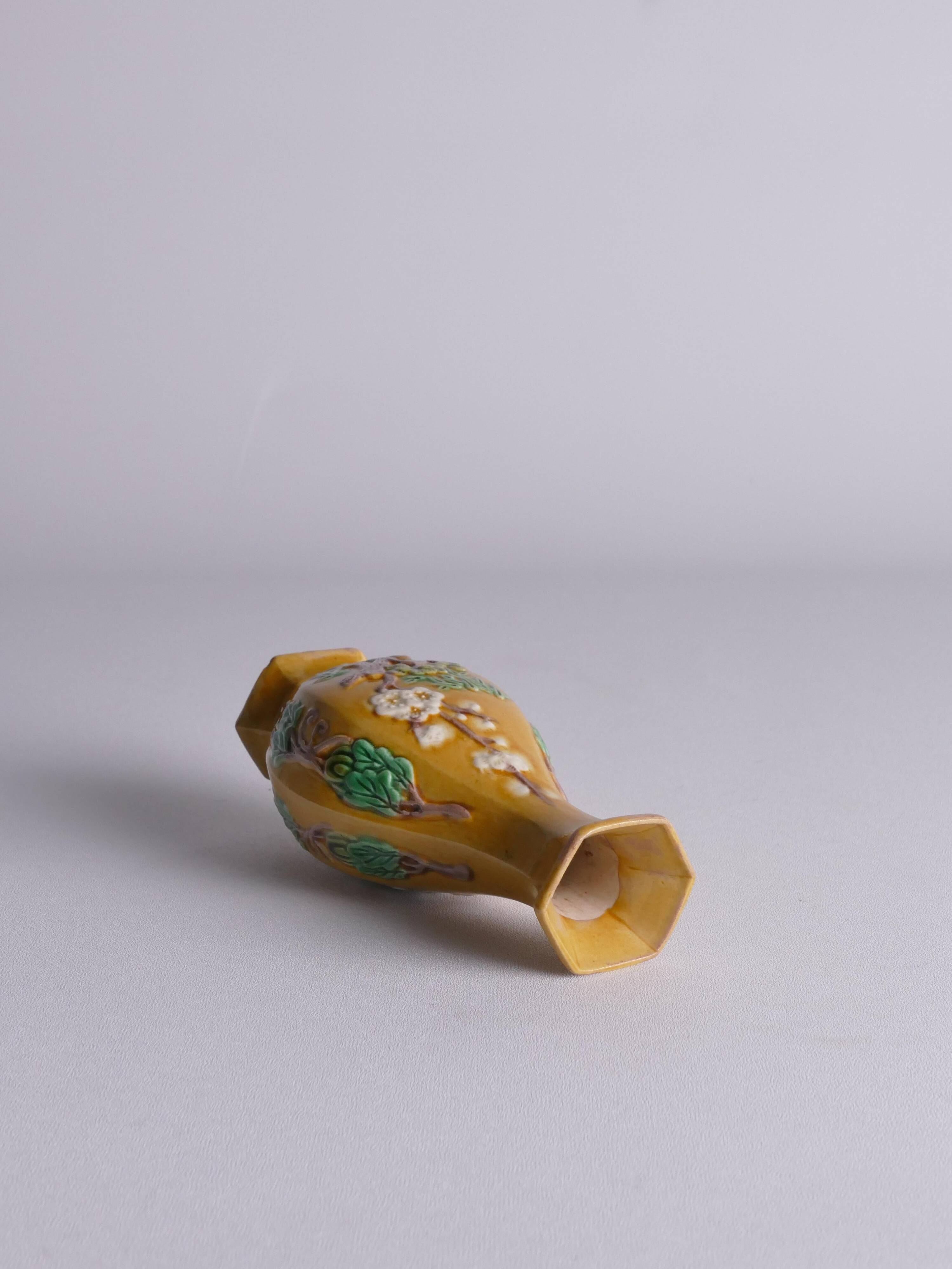 Chinese Yellow Glazed Hexagonal Relief Porcelain Vase with Prunus Motif