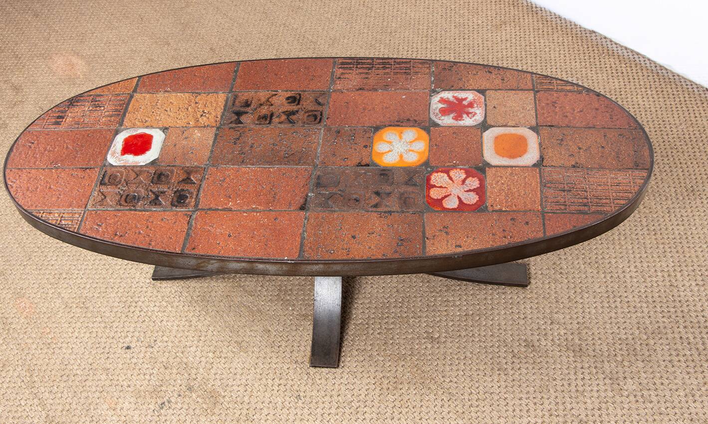 Lava stone, ceramic and steel coffee table by Jean Jaffeux 1960.